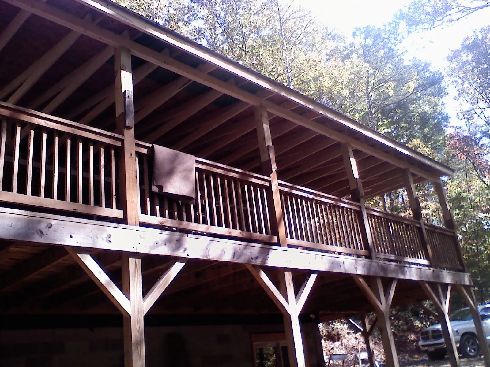 Timber framing under a new elevated porch and deck — Roof Leak Repair in Mont Belvieu by Roofing Brothers